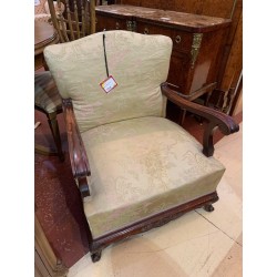 Butaca descalzadora madera vista años 50