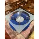 Mesa centro tapa cristal con 4 puffs azules