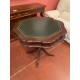 Mesa juego octogonal con cajones sobre piel