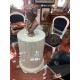 Mesa comedor columna marmol travertino tapa cristal redondo