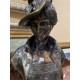 Busto femenino modernista forrado laton